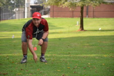 Andrew tweaking a flag placement on Hole 16