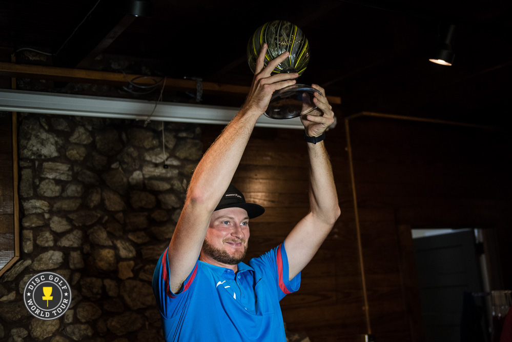Koling hoists the trophy
